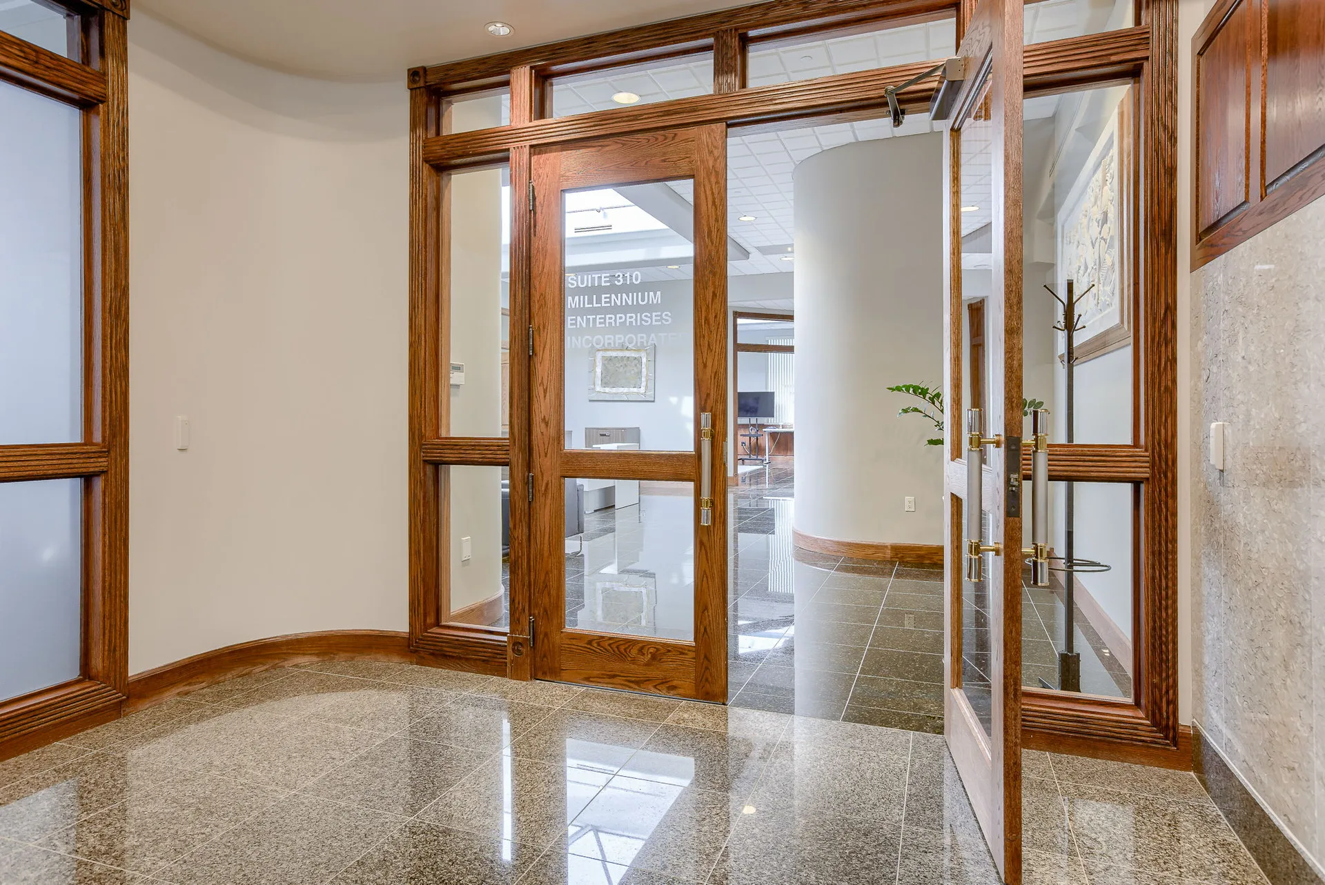 Entry corridor into an available office suite at Millennium Plaza.