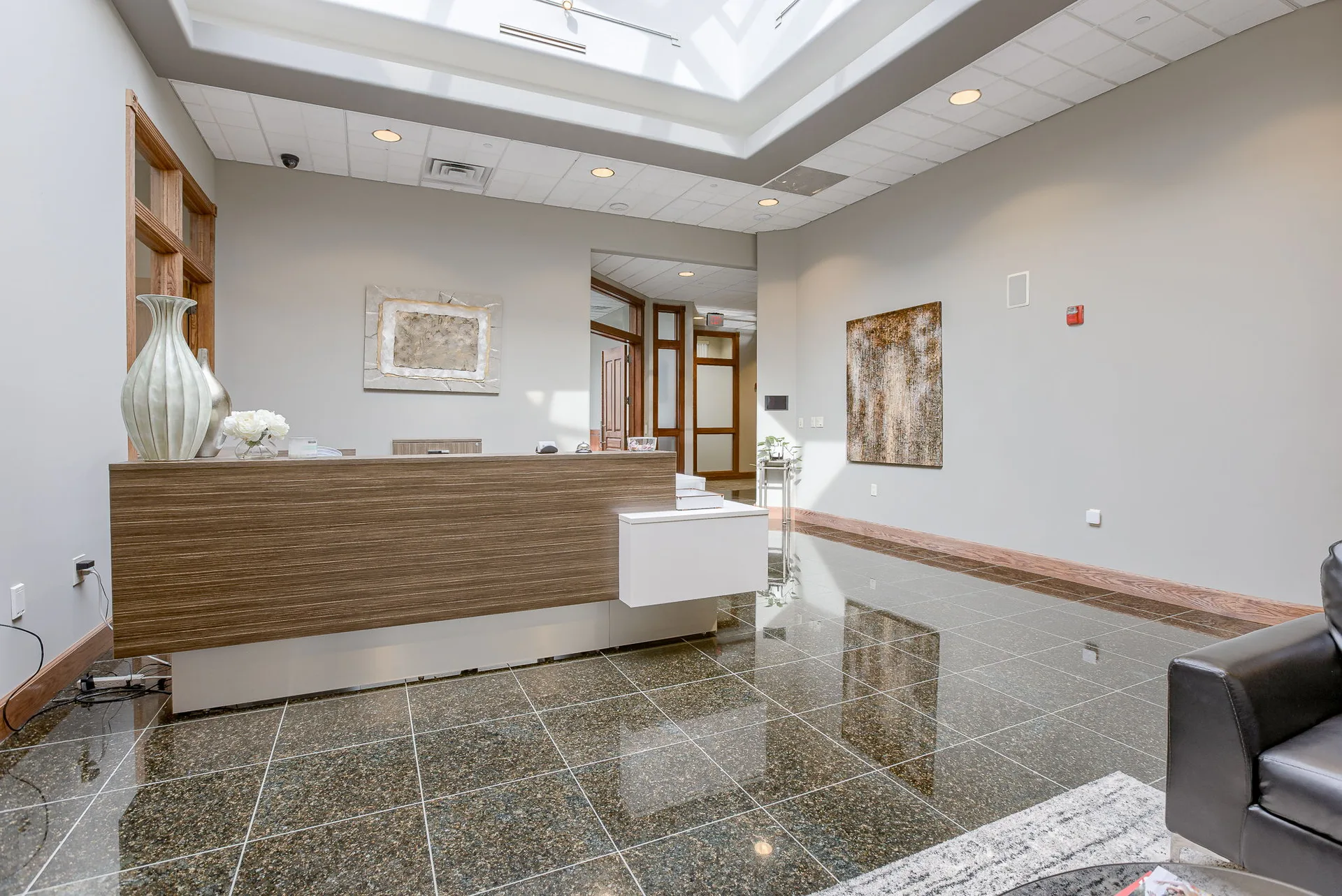 Second private office within an available suite with custom millwork.