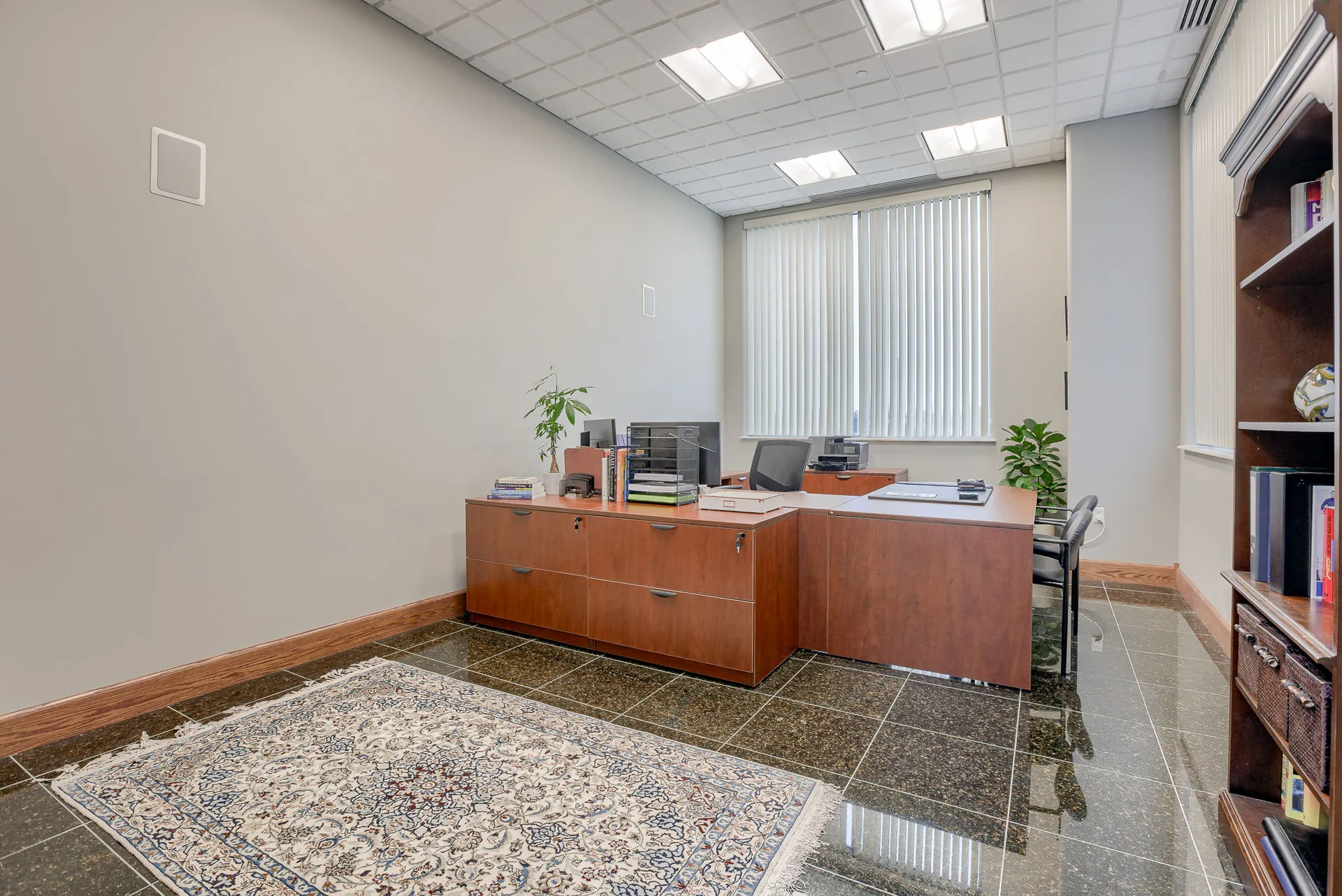 Flex room within an available suite, suitable as office, meeting, or training space.